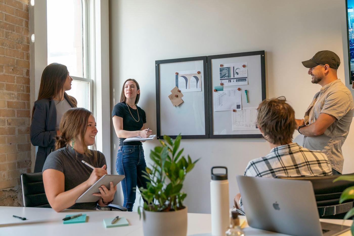 Devocra engineers, designers and marketers planning a project together